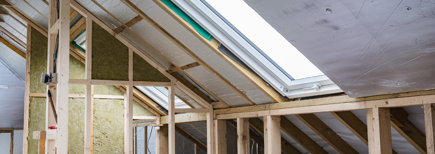 A photo of a ceiling insulation project underway