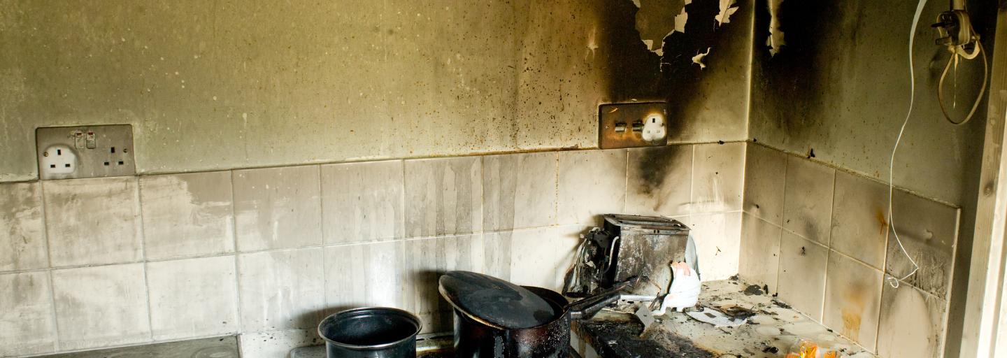 Fire damage has erupted in this home's kitchen